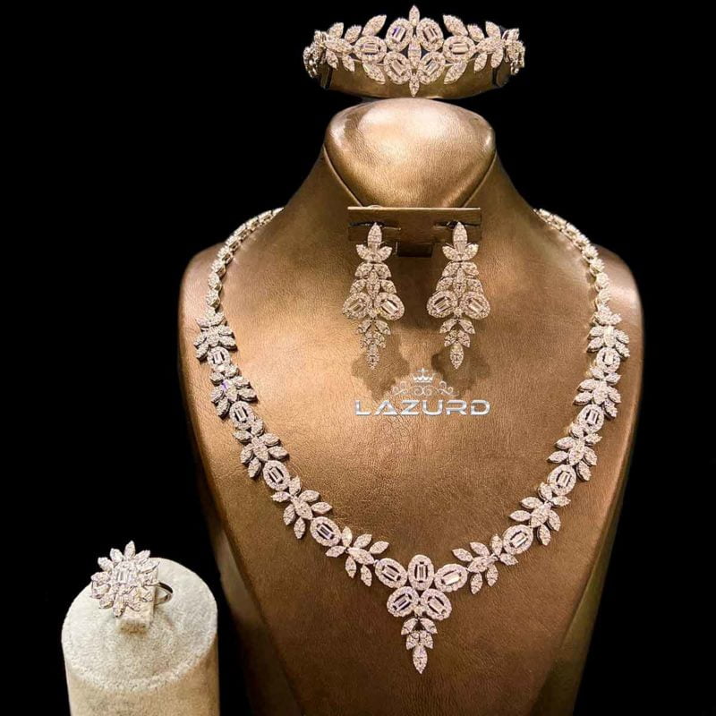 Camilla flower necklace and earring set made of small zircon stones with baguette