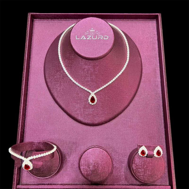 latest bridal jewellery set lara red zircon stone